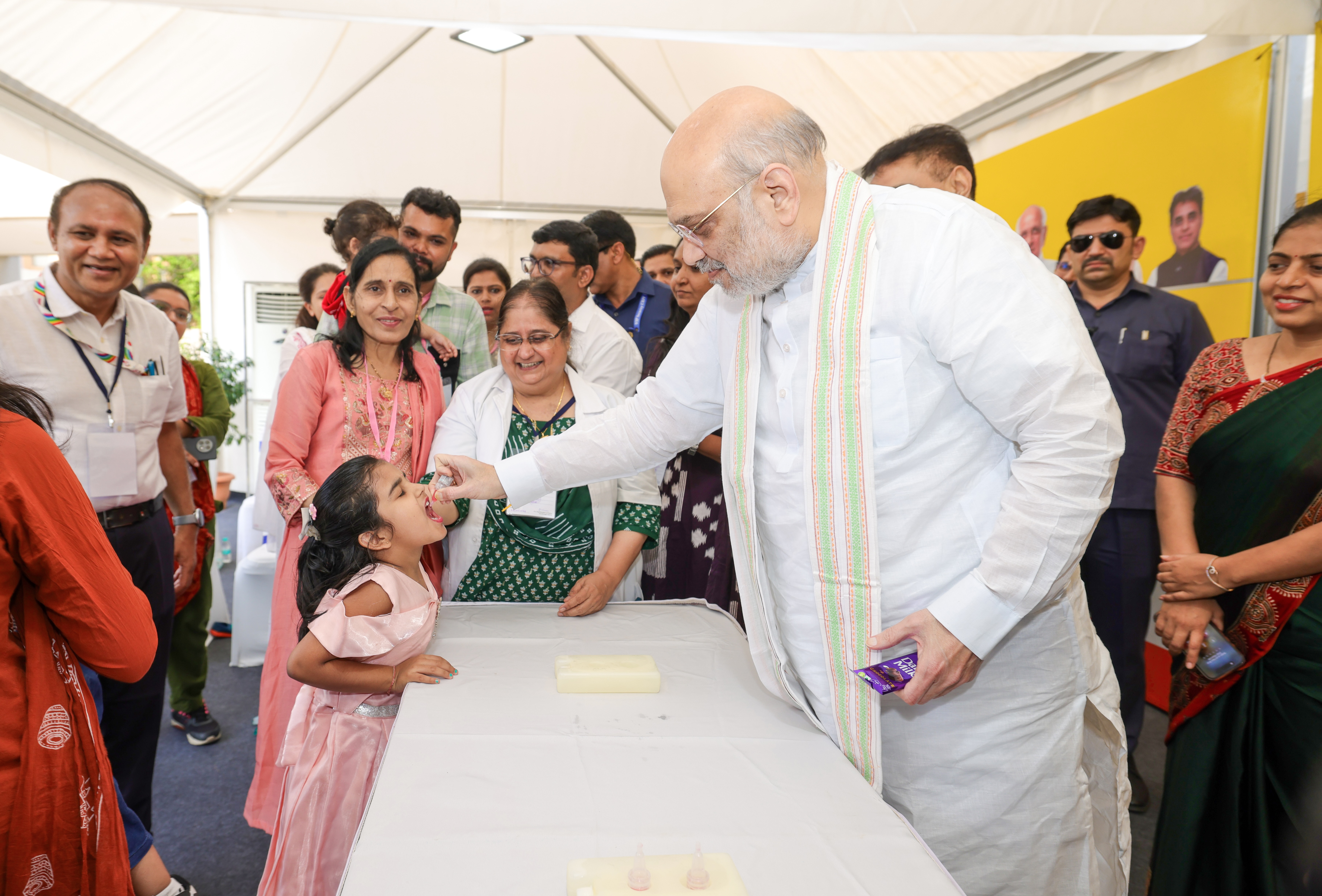 Shri Amit Shah administered polio drops to children today  on the occasion of the launch of the PM Family Care Tracker in Gandhinagar.